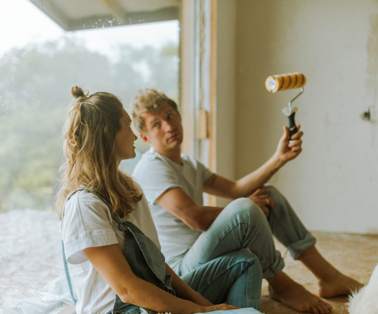 An image of a couple getting ready to decorate